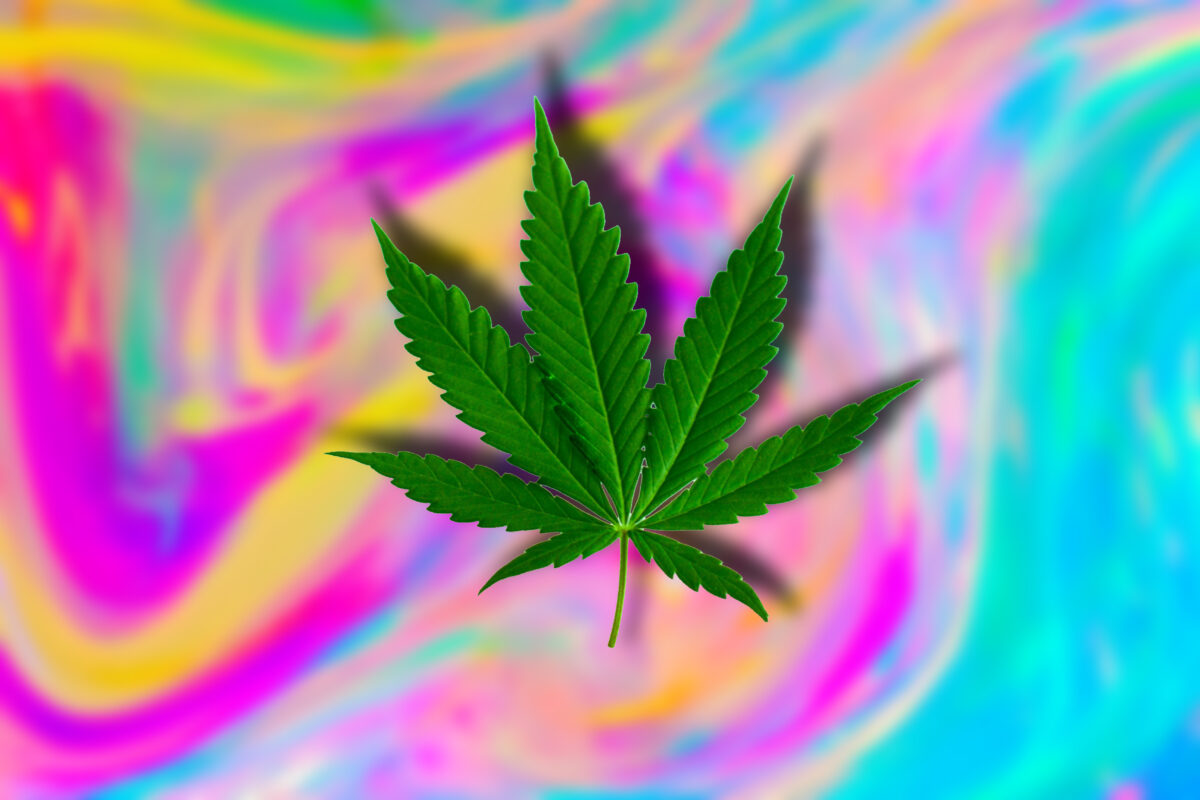 cannabis art and culture forum cover photo - image of psychedelic background with cannabis leaf